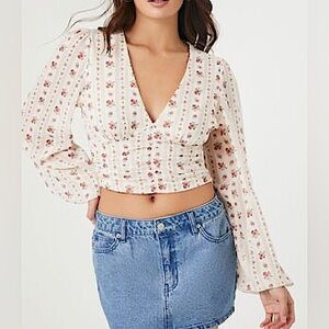 Long sleeve smocked floral crop top